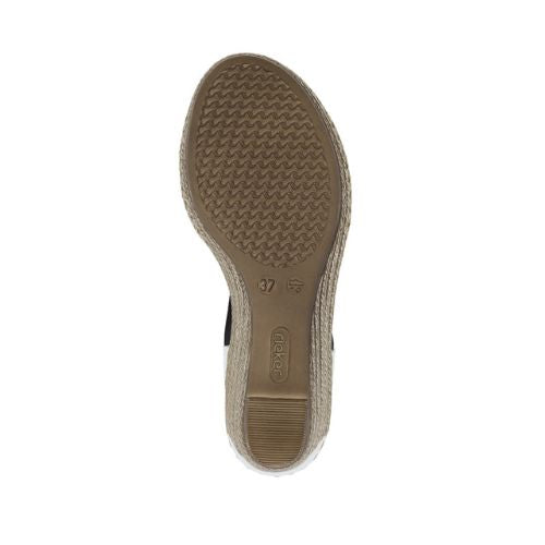 Bottom sole of brown and white Rieker 624H6 Sling-Back Wedge Sandal. Anti-slip design for secure walking.