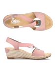 Pair of Pink slingback faux espadrille wedge sandals with elastic side straps, silver medallion, tan Rieker logo'd footbed and brown outsole.