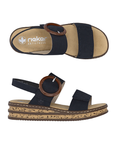 Pair of Navy Backstrap Sandals with a stylish circle buckle, two Velcro straps, tan Rieker logo'd footbed, faux cork layered midsole and black outsole.