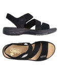Pair of Backstrap Leather Sandals in black with 3 Velcro straps across vamp, pewter accents, tan Rieker logo'd footbed and black outsole.