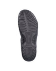 Black outsole of Women's Rieker 64870 Backstrap Sandal with deep grooves for enhanced grip and traction on various surfaces.