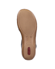 Brown circle patterned, lightly textured outsole with red Rieker logo on heel.