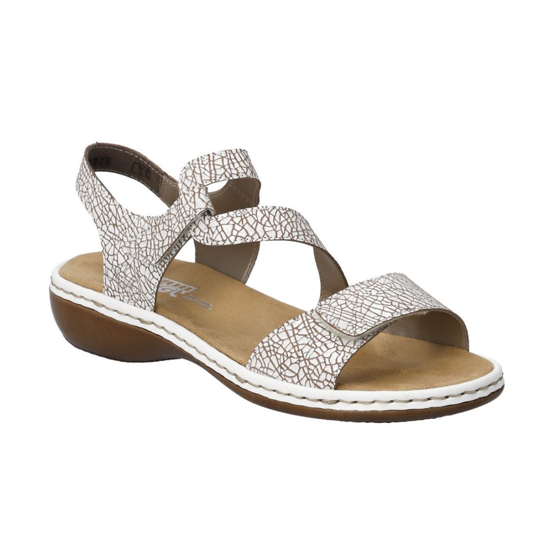 White crackle-texture Rieker 659C7 women's sandal with Velcro straps and cushioned footbed for stylish summer comfort.