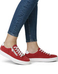 Model wearing red Women's Rieker L59L1 Sneakers with jeans, highlighting stylish summer look and flexible, cushioned comfort.