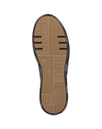 Tan outsole with geometric tread pattern designs and a Rieker logo stamped in heel.