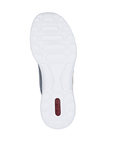 White light treaded outsole with circle and oval patterns and red Rieker logo stamped on heel.