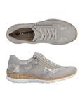 Pair of Soft beige sneakers with shimmery accent panels, lace, side zipper, tan Rieker logo'd footbed, faux cork midsole and white outsole.