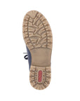 Brown outsole of women's boot with red Rieker logo on heel.