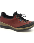 Red slip on sneaker with bungee lace, colorful accent eyelets with black toe wrap, brown midsole and black outsole.
