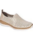 Beige perorated slip-on shoe with faux cork midsole and white outsole.