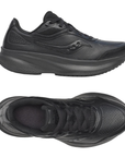 Pair of all black leather walking sneakers with thick midsole and rocker, light treaded outsole.