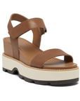 Women's Sorel Joanie IV Y-Strap Wedge Leather Sandal in brown with white and black platform sole, perfect for elevated everyday style.