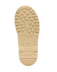 Tan outsole with thick circle tread pattern and Sorel logo stamped in middle.