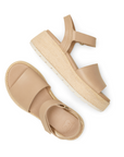 Pair of Beige backstrap sandals with a thick band over toe, Sorel logo'd footbed and a woven pattern platform sole.