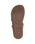 Outsole view of Women's Taos Prize 4 Slide Sandal in beige, featuring textured rubber sole for traction and durability.