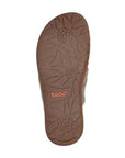 Bottom view of Women's Taos Gift Slide Sandal showing floral-patterned rubber outsole for grip and durability in stylish casual footwear.