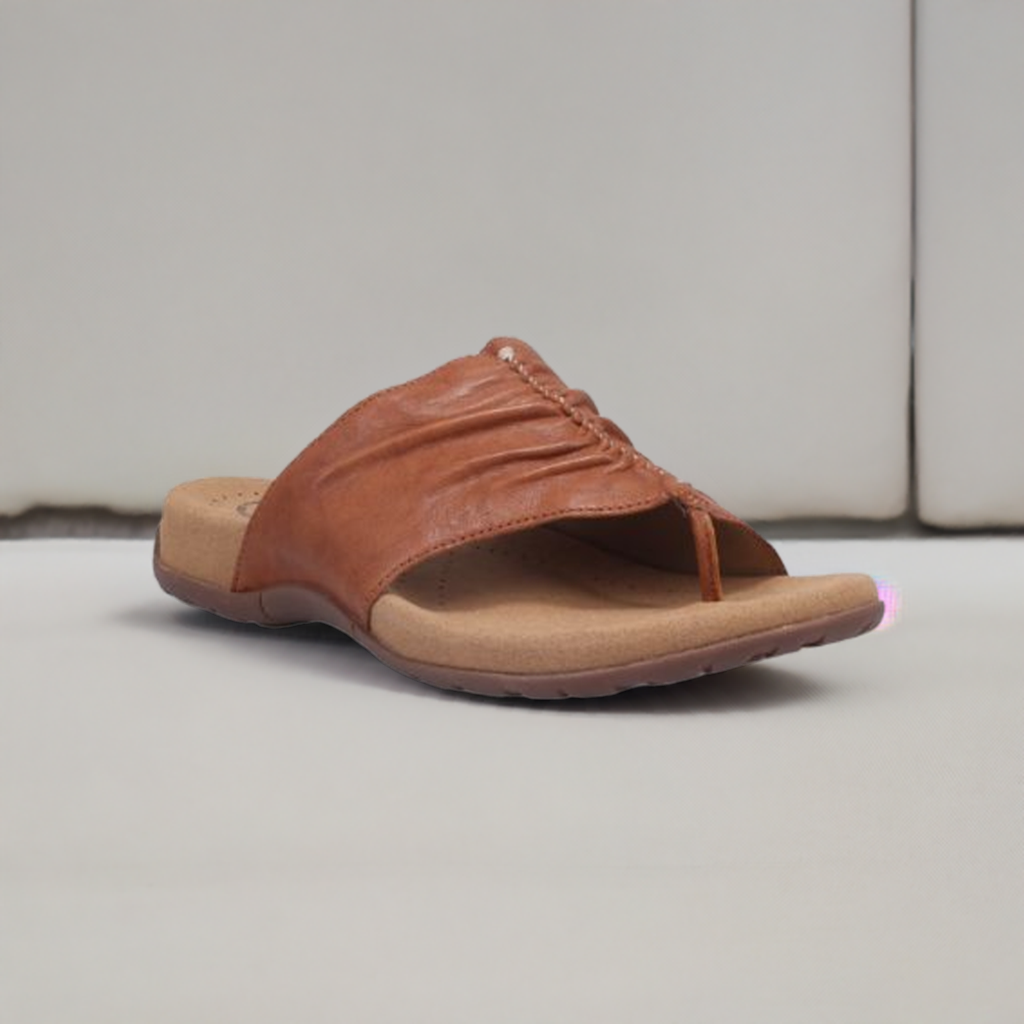 Brown leather Women's Taos Gift Slide Sandal with toe-ring design and contoured footbed, displayed on a neutral background for product showcase.