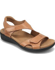 Backstrap Sandal in tan leather with Velcro straps and tan Taos logo'd footbed and black outsole.