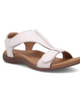 Backstrap leather sandal in white with two adjustable Velcro straps, t-strap design, tan Taos logo'd footbed and brown rubber outsole.