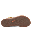 Leaf printed tread patter on brown outsole with orange Taos logo stamped in middle.