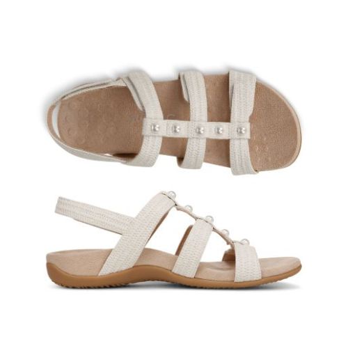 Top and side views of Women's Vionic Amber Backstrap Sandals in cream, showcasing arch support and flexible sole design.