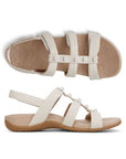 Top and side views of Women's Vionic Amber Backstrap Sandals in cream, showcasing arch support and flexible sole design.