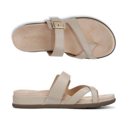 Top and side view of Carmela Toe Loop Sandal showing ergonomic footbed, leather straps, and flexible sole for all-day comfort and support.