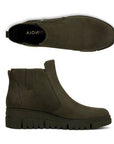 Side and top view of Vionic Uptown Sur Ankle Boot showcasing its sleek waterproof suede upper and supportive wedge sole for women.
