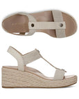 Side and top views of Vionic Calera Wedge Sandal showcasing the cushioned footbed, backstrap, and textured wedge heel for all-day wear.