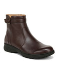 A brown ankle boot with a zipper, side buckle detail and a black outsole.
