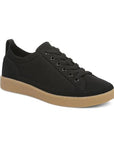 Black knit sneaker with black elastic laces, detailed stitching and thick tan outsole.