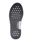 The black rubber outsole of a shoe with a textured tread pattern in triangular cutouts and the brand name 'ZIERA' printed vertically in white.