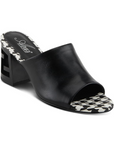An Azura black open toe leather block heel sandal with black and white checkered footbed.