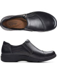 Top and side views of the black Clarks Carleigh Ray slip-on shoe for women, showcasing its sleek design and supportive footbed.