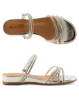 Pair of Silver sparkly slide sandal with multiple criss-crossing straps, tan Patrizia logo'd footbed and low silver wedge outsole.