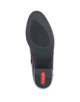 Black light treaded outsole with red Rieker logo on low block heel.