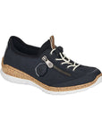 Slip-on sneaker in dark navy with bungee laces, decorative side zipper, faux cork midsole and white outsole.