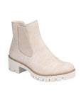 A beige Chelsea ankle boot with a chunky sole and side elastic goring.