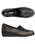 Pair of Brown slip-on wedge shoes with black leopard print pattern accents and black rubber outsole.