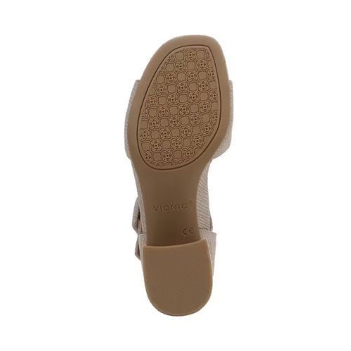 Textured tan outsole on block heel with Vionic logo stamped in middle