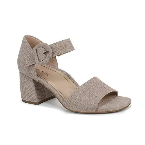 Greyish beige textured leather block heel with square open toe, decorative buckle on velcro ankle strap and a tan Vionic logo'd footbed.
