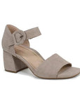 Greyish beige textured leather block heel with square open toe, decorative buckle on velcro ankle strap and a tan Vionic logo'd footbed.