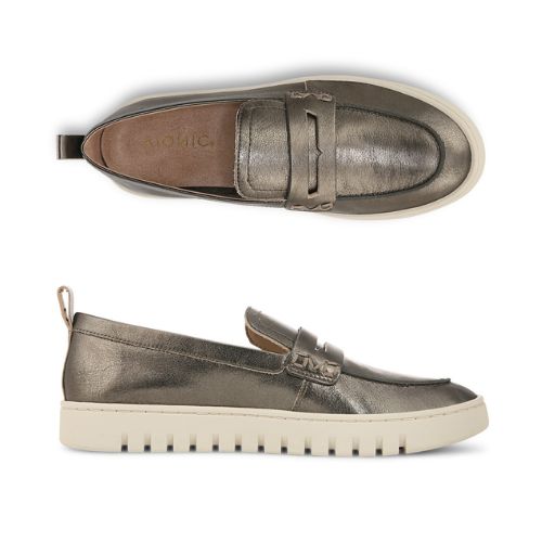 A pair of Women's Leather Loafers in Silver metallic leather, tan Vionic logo'd footbed with white sole.