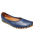 Navy leather ballet flat with tan footbed and off-white accent stitching to attach rubber outsole.