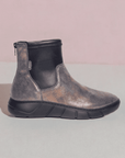 Stylish Women's Cloud Deja Ankle Boot in soft metallic leather with black accents, perfect for casual fall outfits and comfortable daily use.