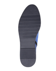 Black rubber light treaded outsole of ankle boot.