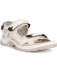 An Ecco Yucatan light and dark tan nubuck sandal with black accents on velcro heel, instep and toe straps. Footbed is tan, midsole is white, and outsole are grey.