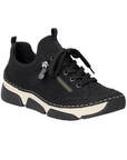 Black sneaker with faux side zipper, accent stitching above the thick white midsole and black outsole.