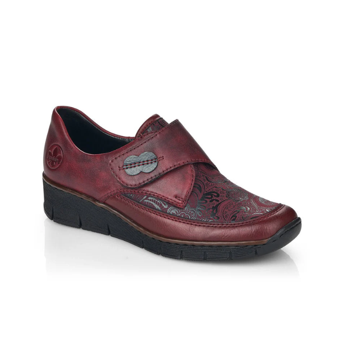 Red Rieker 537C0 women's slip-on shoes with floral embossed design and wedge heel, offering lightweight comfort and fall-ready style.