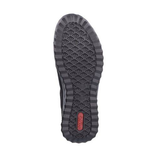 Outsole of Women's Rieker 59071 Slip-On Shoe featuring textured grip pattern and durable waterproof sole for all-day comfort.
